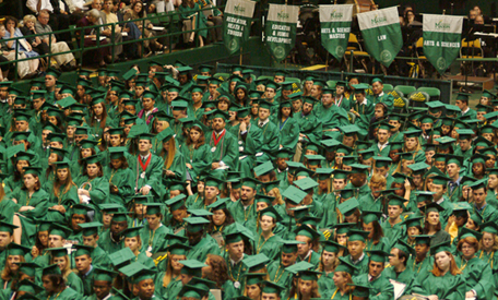graduation at George Mason University - a sea of green caps and gowns