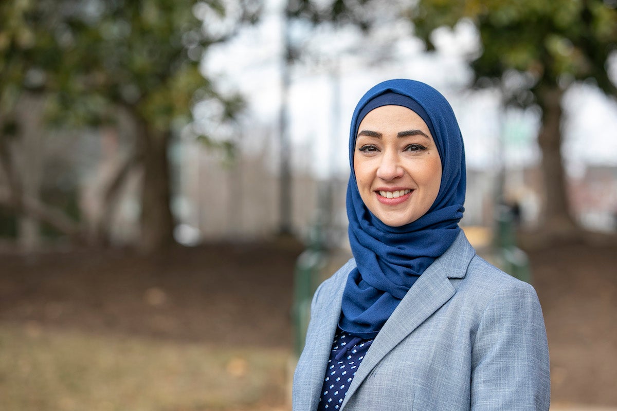 woman in a head scarf outside