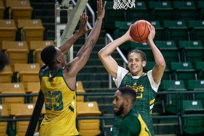 men playing basketball