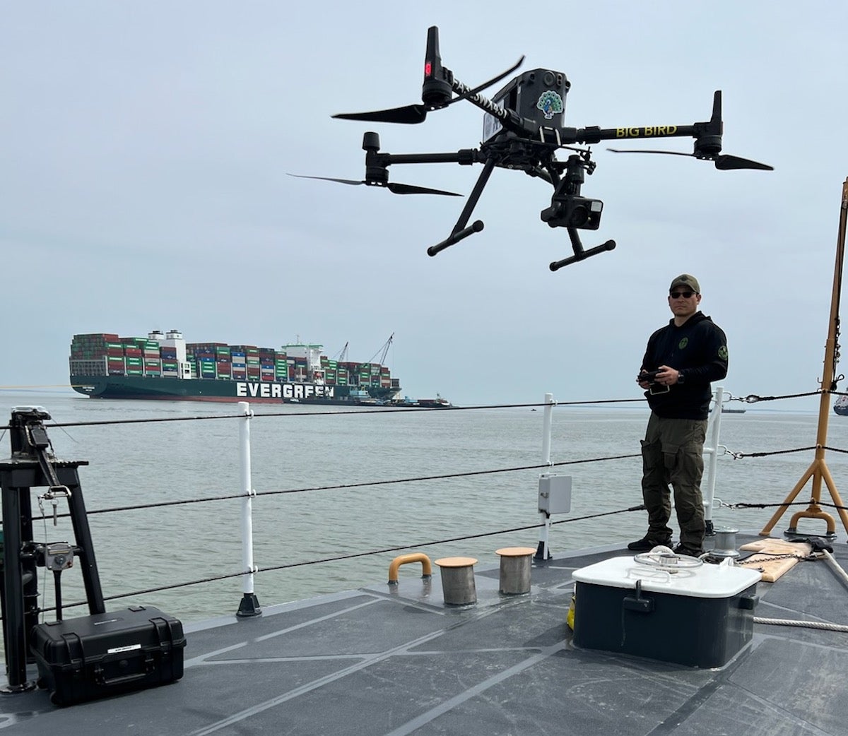guy on a ship with drone