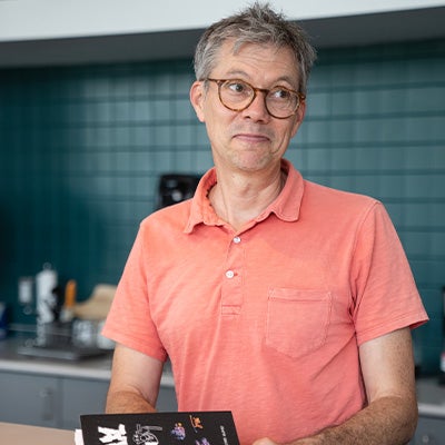 Peter Streckfus making chapbooks for students at the JDC. Photo by Evan Cantrell/OUB.
