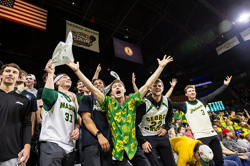 Mason Fans celebrate a basketball Homecoming victory