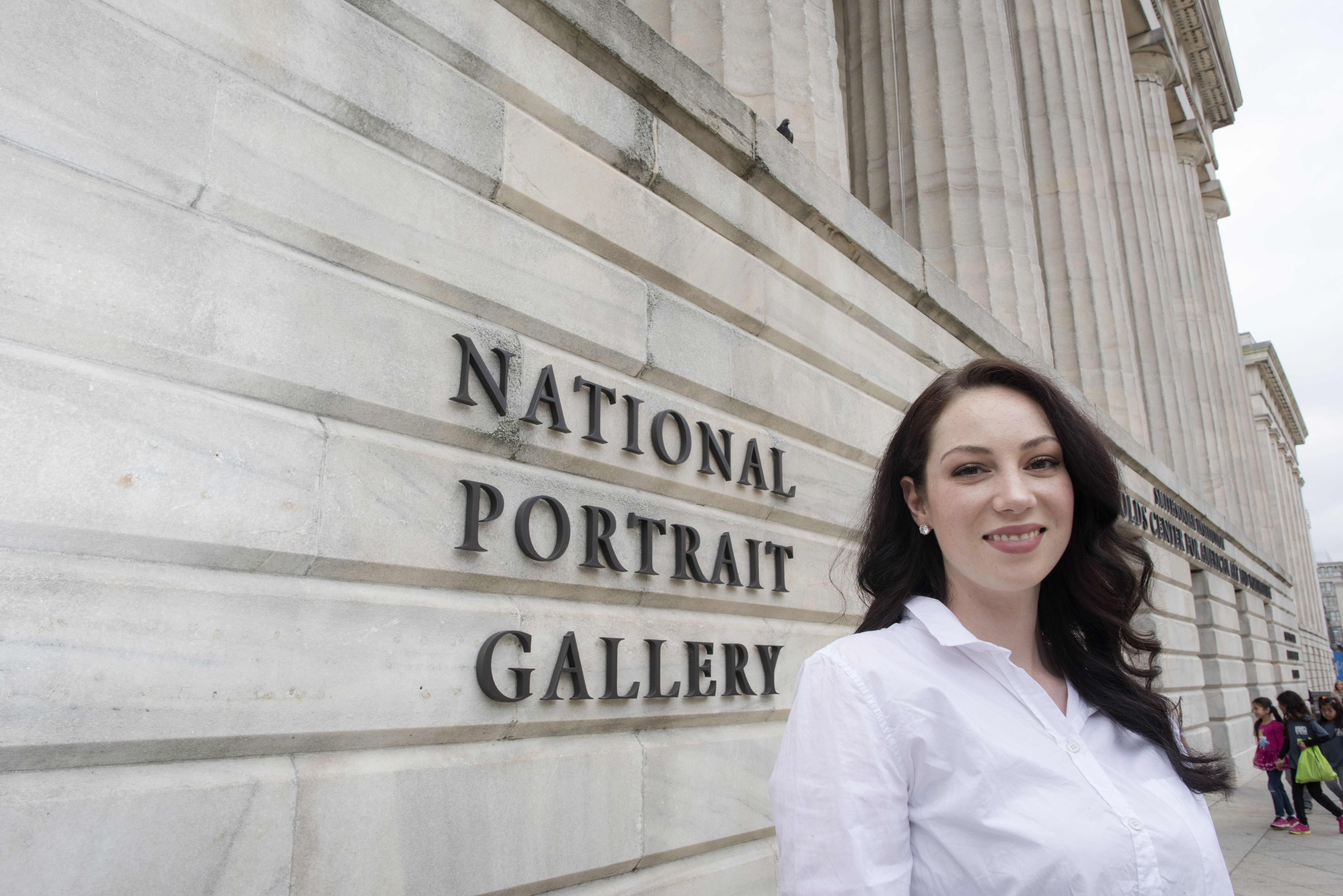 Mason graduate student Ina Descartes in front of the National Portrait Gallery