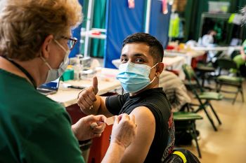 George Mason student getting vaccine at Eagle Bank Covid-19 Clinic. 