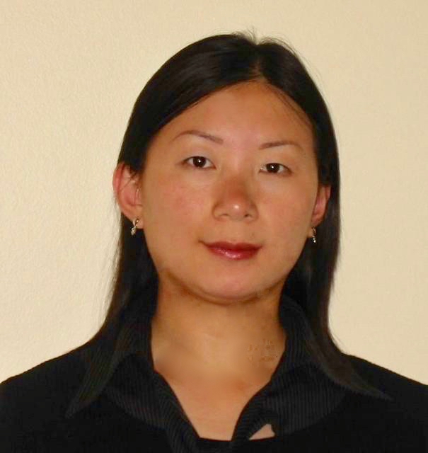 Mason professor Lily Wang has black hair and wears a black shirt in her faculty profile