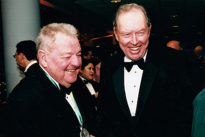 two men in tuxes