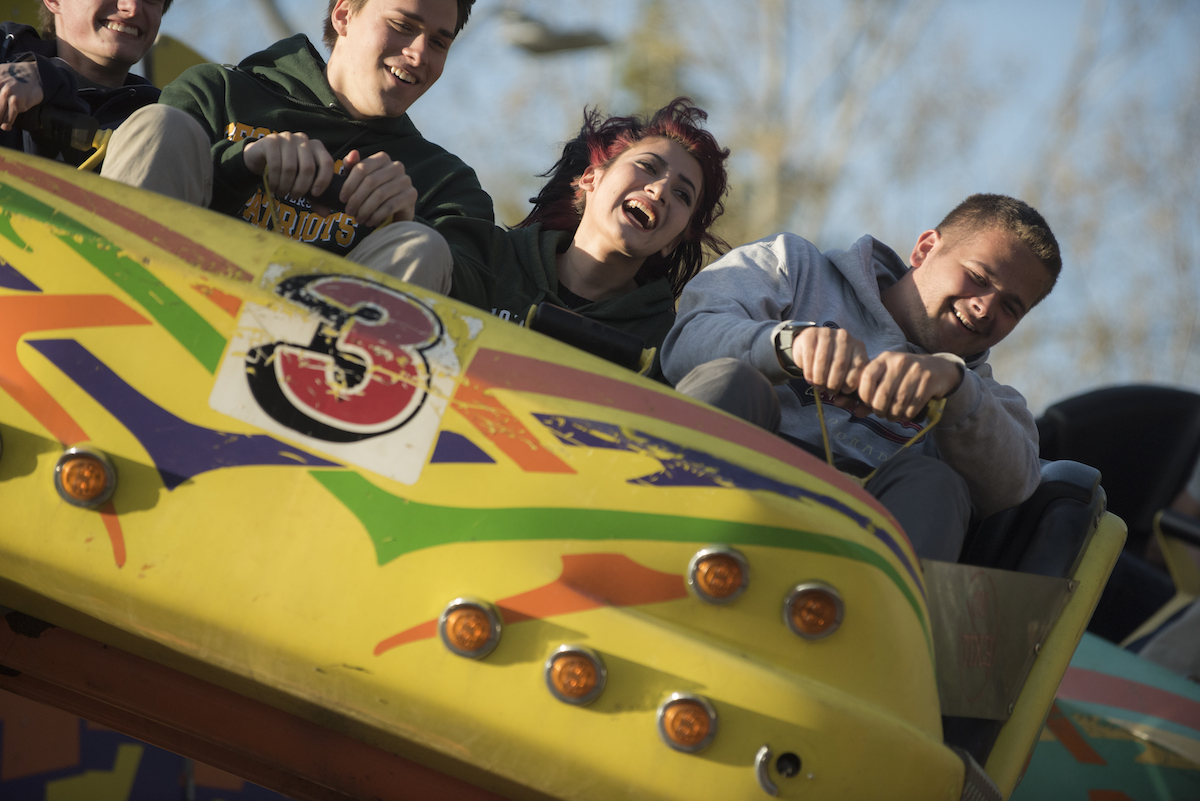 young people on an amusement ride