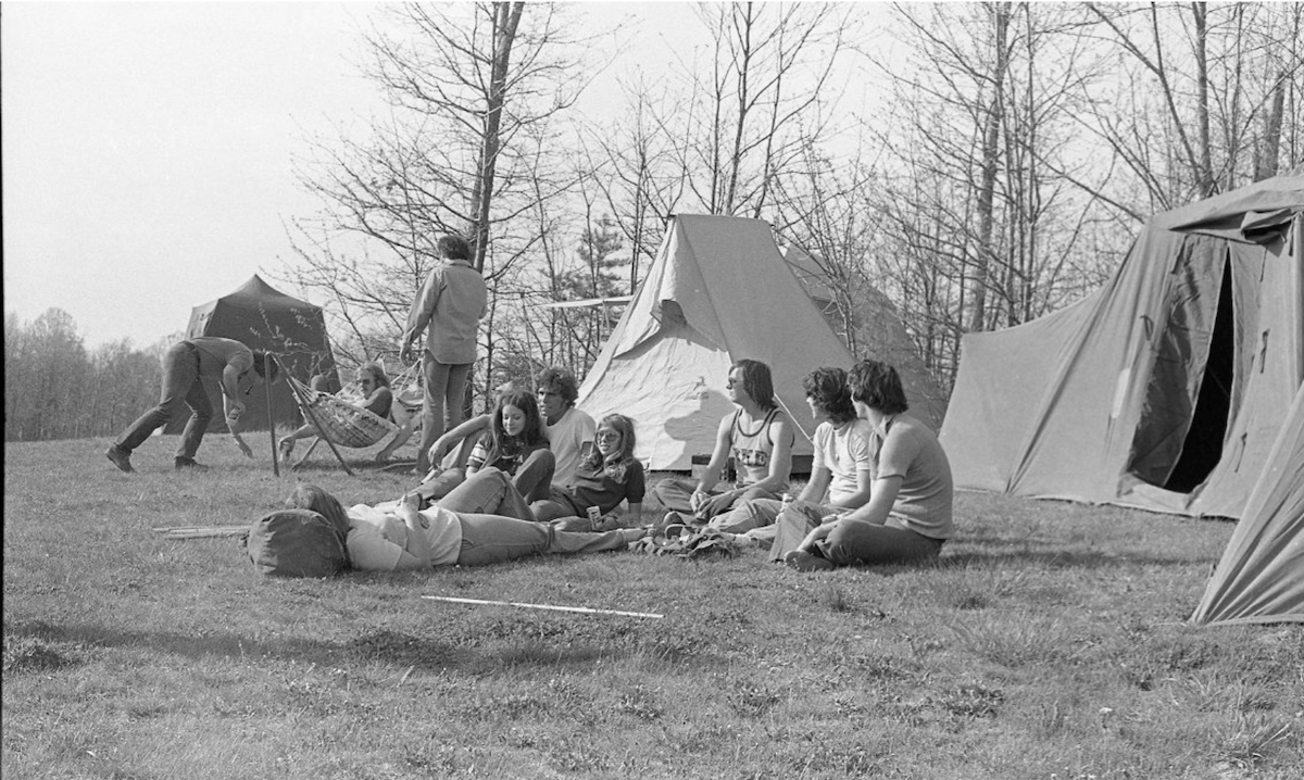 bw photo of students with tents