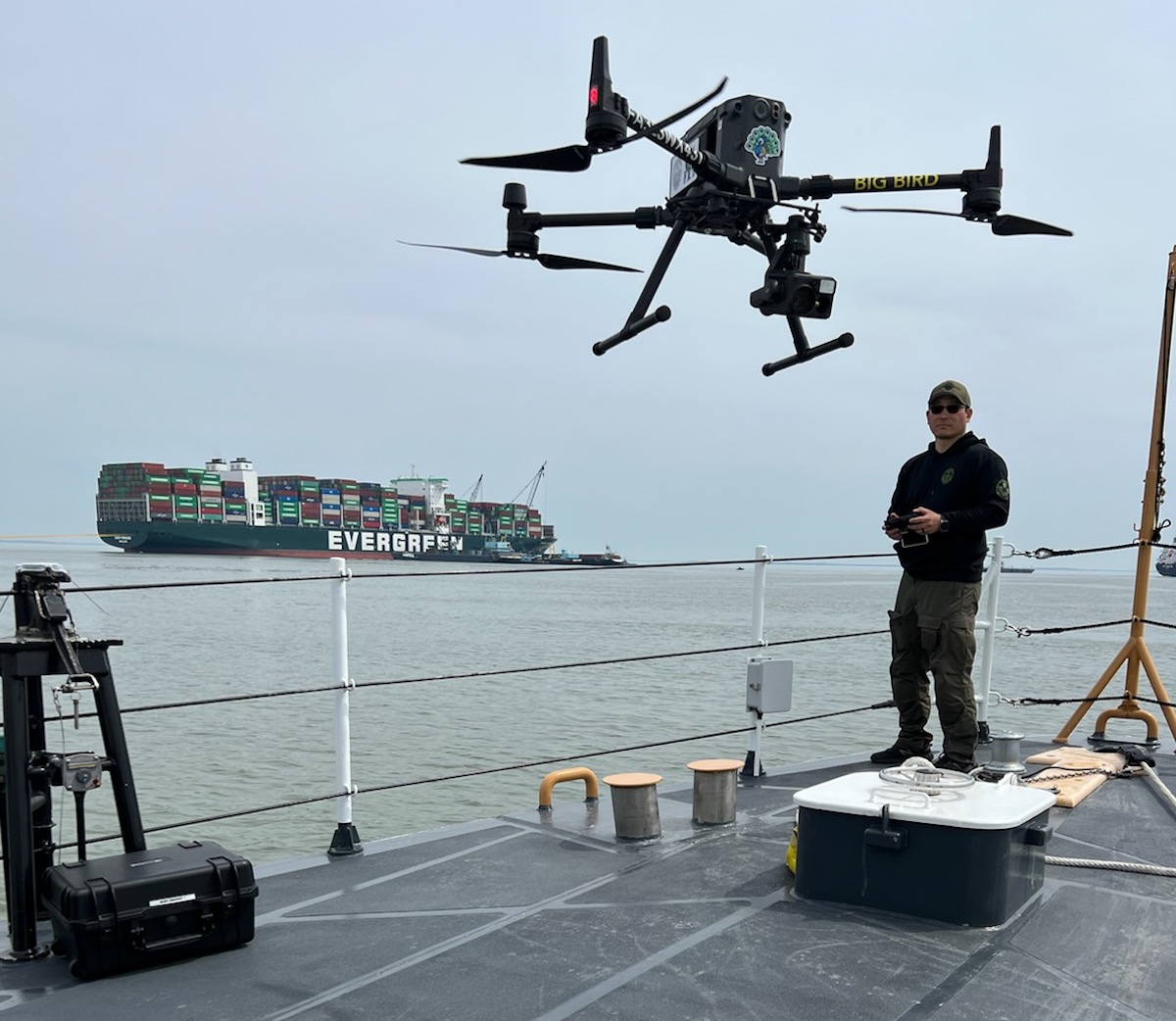 guy on a ship with drone