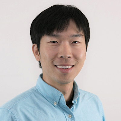 Meyeong Lee wears a teal-colored shirt for his faculty profile in the IST department at George Mason University