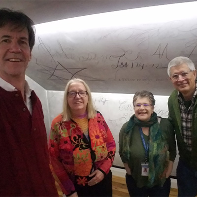 From left to right: Mike Toth, Peggy Misch from Brandy Station Foundation's Graffiti House, Andrea Loewenwarter from Fairfax City's Historic Blenheim, and Mills Kelly.