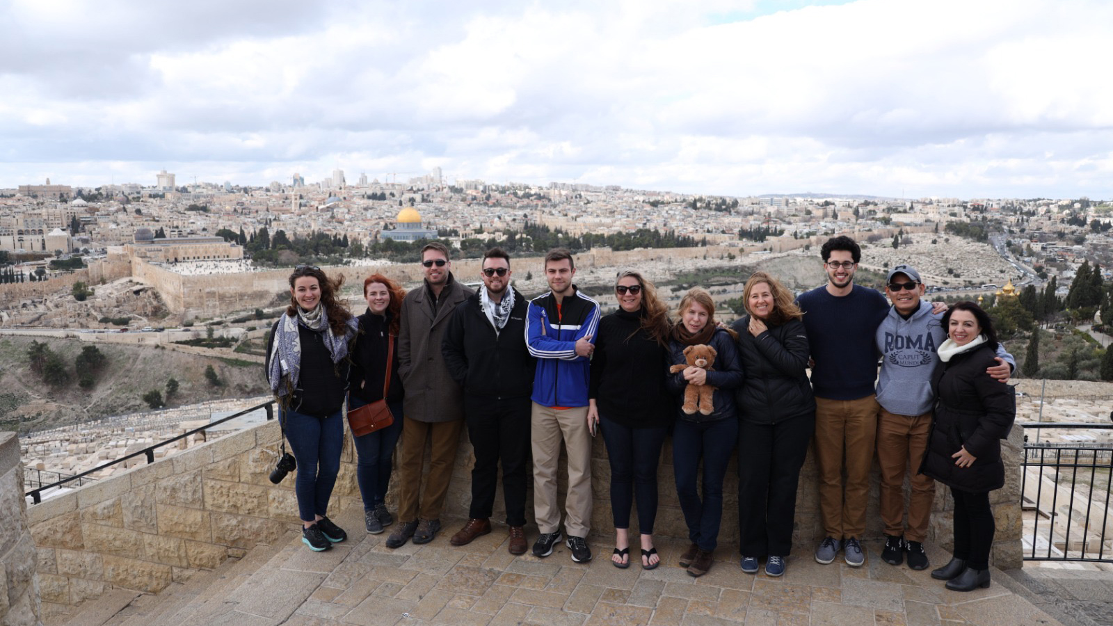 Fakhira Halloun stands with her students for a group photo in Jerusalem.