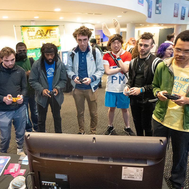Participants playing a video game at GAMEmason2023. Photo by Evan Cantwell.
