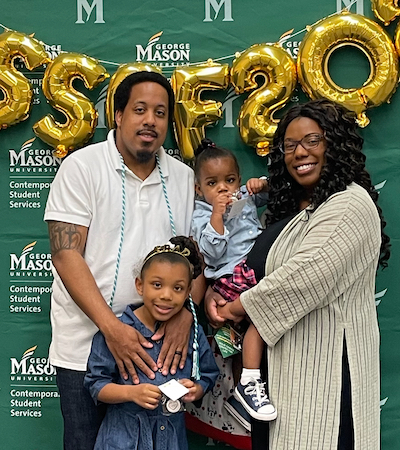 Angelo Collington and his family at campus event