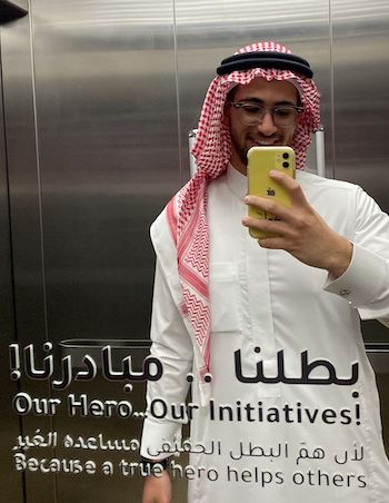 Adel Batterjee in Saudi Arabia, wearing local attire