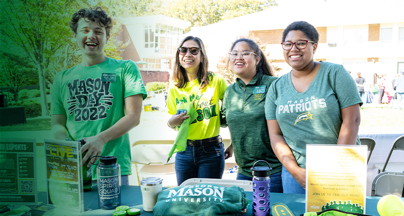 A team of Mason ambassadors and students table during an admissions event on the Fairfax Campus.