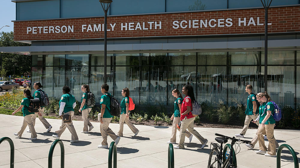 Nursing students leave Peterson Family Health Sciences Hall