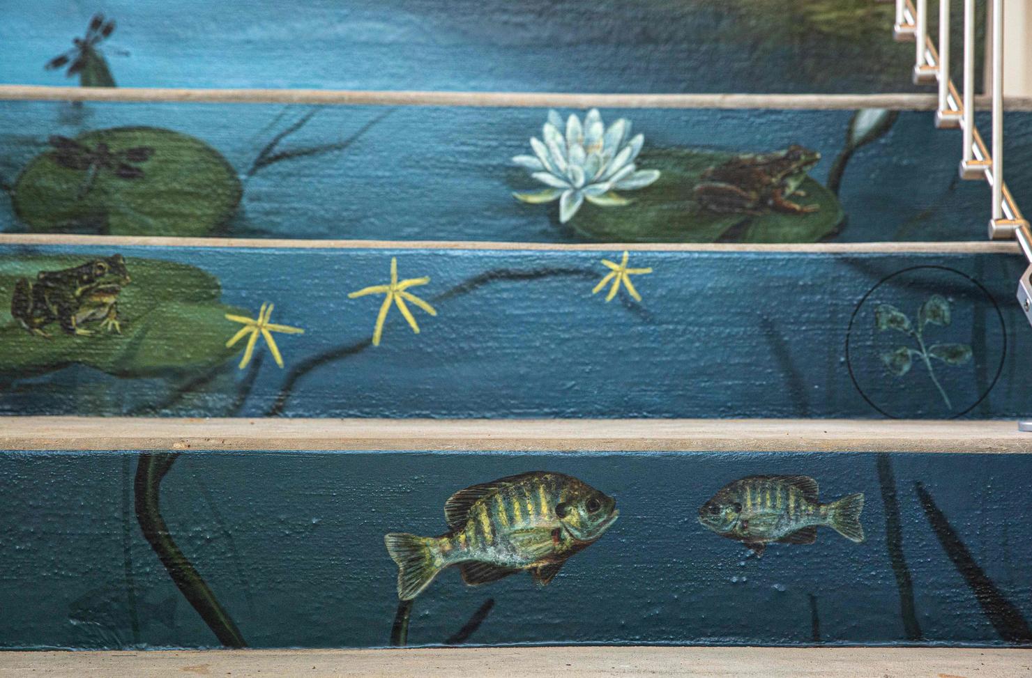 The Sediment to Sky staircase mural depicts wildlife and animals of the Potomac River watershed.