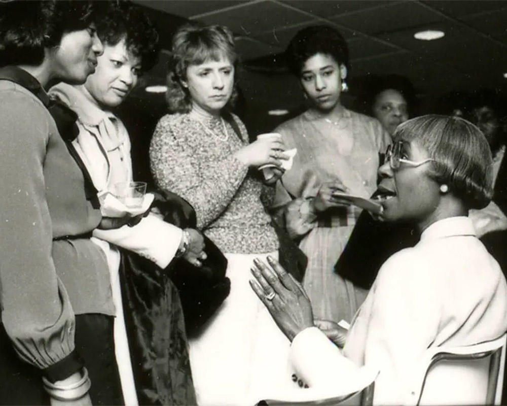 Former US Representative Shirley Chisholm speaking with a group at George Mason University, 1985