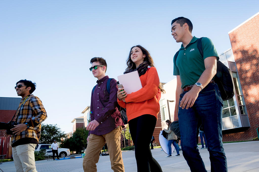 Students walk across campus.