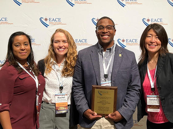 Left to right, Ana Lobaton, Rachel Stockdale, Philip Wilkerson III, and Satoko Odagawa accept the Innovation in Diversity and Inclusion Award at the EACE conference.