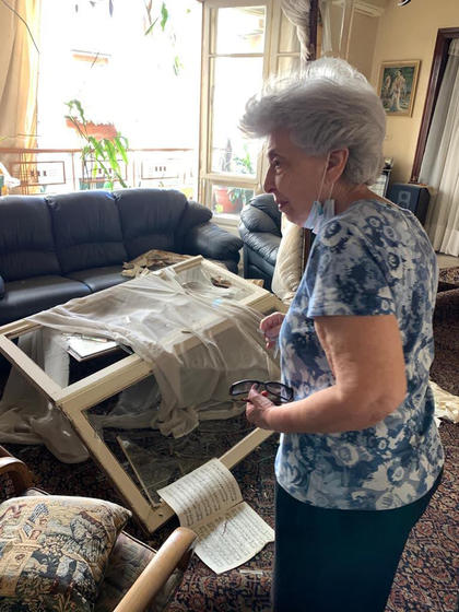 May Abboud Melki assesses the damage to her home after the Beirut explosions.