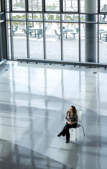 Rachel Wernicke sits in an open space in Horizon Hall 