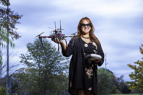 Aliyah Pandolfi with one of the anti-poaching drones.