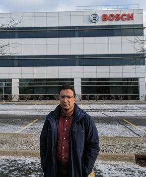 Dr. Sephar Salari standing in front of his workplace at Bosch USA corporation