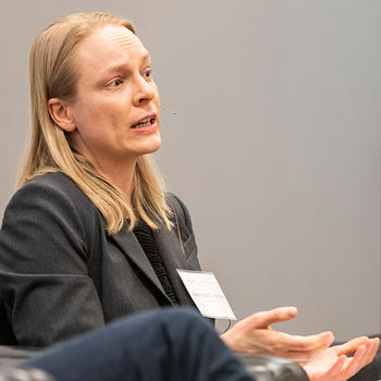 Jeannette Chapman speaking during a panel discussion.