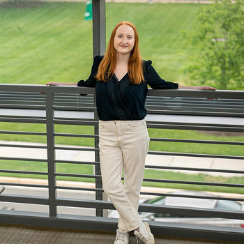 Social Work student McKenzie Lauber poses in Peterson Hall. Photo by Cristian Torres.